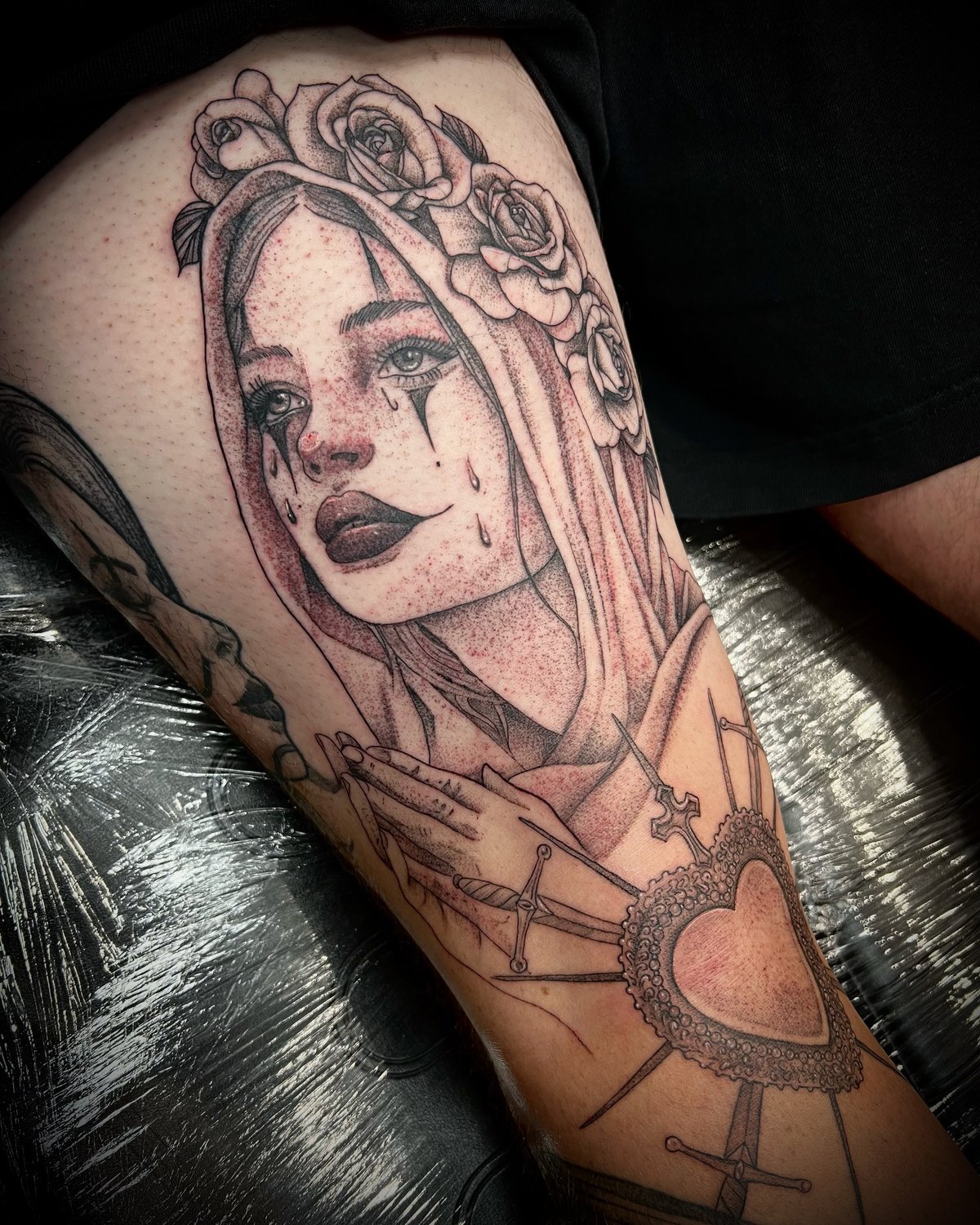 Crying gothic Madonna with a rose crown and pierced sacred heart, in fine-line dotwork